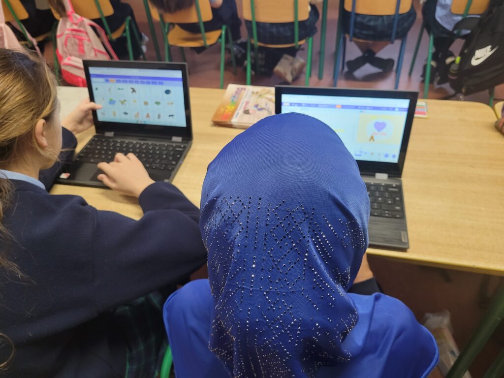 Pupils working with block-based coding using Scratch